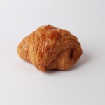 Couque au beurre, une pâtisserie feuilletée et croustillante au beurre, idéale pour accompagner votre café ou pour une pause sucrée.