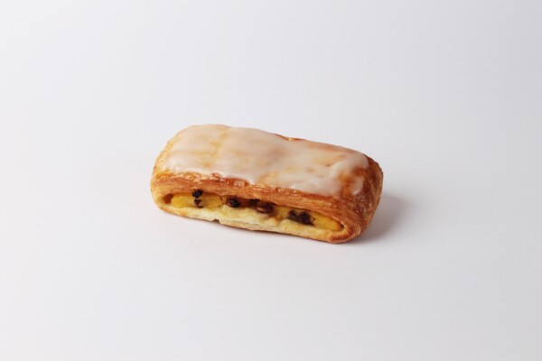 Couque Suisse longue, une pâtisserie moelleuse et chocolatée, idéale pour accompagner votre café ou pour une pause sucrée.