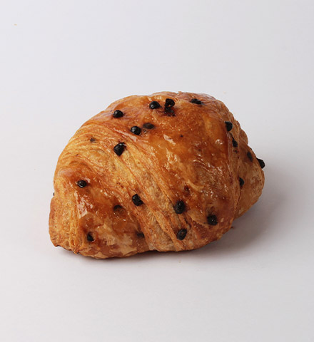 Couques au beurre généreuses, avec raisins ou pépites de chocolat. Fondantes et croquantes. Fournies par Panistar, fournisseur de couques au beurre pour les boulangeries.